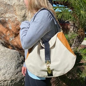 Olivia + joy purse with three tone leather, black, tan and crème. Gold Hardware